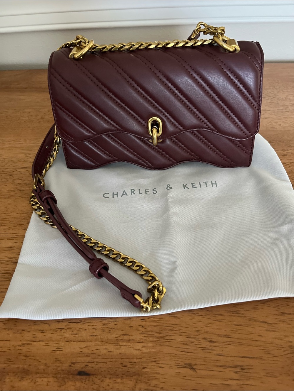 Charles & Keith Quilted Crossbody Bag in Deep Burgundy with Gold Chain